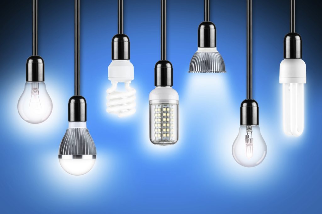 row of different types of glowing light bulbs